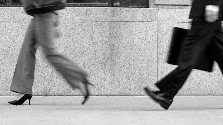 Commuters in motion — a visual pause before the conclusion